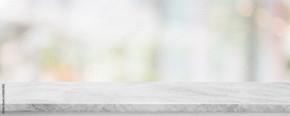 Empty white marble stone table top and blur glass window interior cafe and restaurant banner mock up abstract background - can used for display or montage your products. - obrazy, fototapety, plakaty 