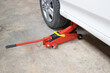 © piyaphunjun - Car floor jack for car for repair check Maintenance of cars