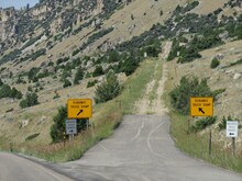 Medium Wide Shot Of A Runway Truck Ramp On A Cliffside To Help Prevent Accidents At Bighorn Mountains In Wyoming.