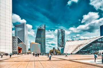 Wall Mural - PARIS, FRANCE - JULY 06, 2016 :La Defense, Business Quarter with businessmen in the streets, area of Paris,  French financial center with skyscrapers and modern buildings.