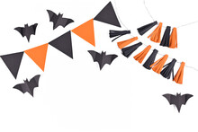 Halloween Background With Garlands And Paper Bats In Traditional Colors Orange And Black On White Background With Copy Space