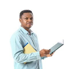 Wall Mural - African-American man with books on white background