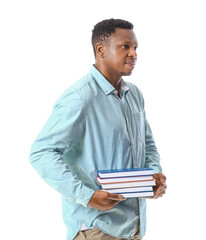 Wall Mural - African-American man with books on white background