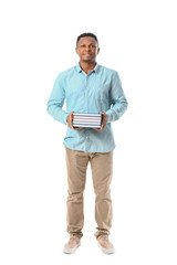 Wall Mural - African-American man with books on white background