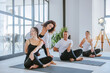 © lithiumphoto - Yoga class of young people group indoor
