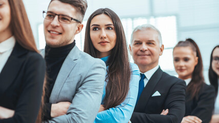 Wall Mural - close up. a group of diverse smiling business people standing in a row