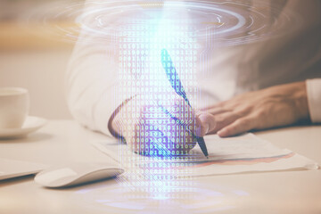 Man in white shirt with technology icons.