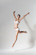 © Artem Popov - beautiful jumping woman in white underwear