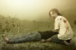 © Leo Lintang - Scary zombie with blood and wound on his body eating a dead man