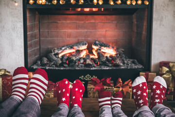 Wall Mural - Happy family with children near fireplace at Christmas