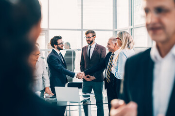 Poster - close up. business partners meeting each other with a handshake.