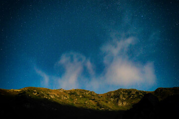 Canvas Print - Mountain landscape at night with many stars