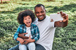 © Afshar Tetyana - Happy father and his lovely son taking selfies outdoors