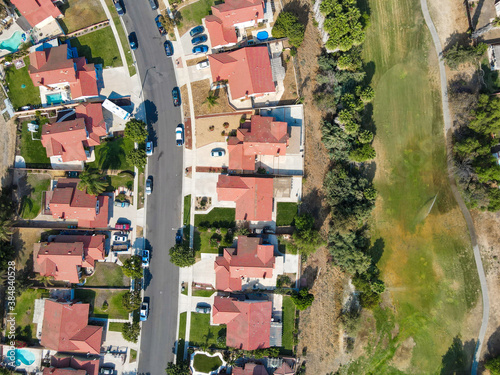 Aerial top view of Southern California houses in inland town Corona, during hot summer. USA