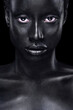 © Mike Orlov - Cheerful young african woman with art fashion makeup. An amazing woman with black bodyart