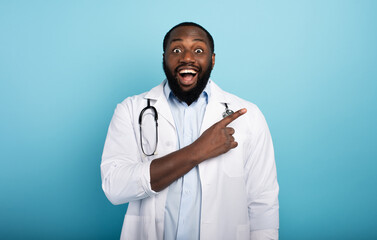 Smiling doctor is happy to win against the coronavirus. Cyan background