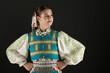 © muro - Slovak folklore. Traditional costume. Beautiful girl in traditional dress.
