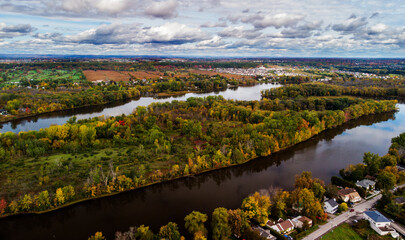 Wall Mural - canadian autumn, aerial view of laval city in quebec