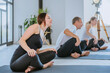 © lithiumphoto - Yoga class of young people group indoor