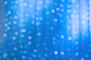 Wall Mural - blurred focus of decorative lights in blue background