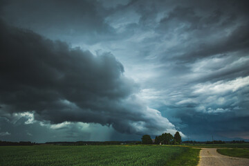 supercell storm clouds with wall cloud and intense rain