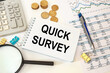 © Superzoom - Quick Survey inscription on notebook