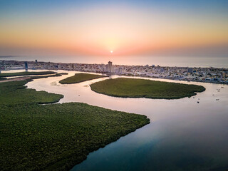 Wall Mural - Ras al Khaimah emirate in the UAE aerial sunset view