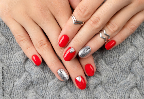 Fotografering Woman's hands with fashionable red manicure.