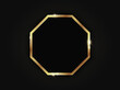 Octagonal golden sparkling frame isolated on a black background.