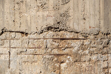 Reinforced Concrete With Damaged And Rusty Steel Reinforcement. Old Distressed Wall Texture Background,