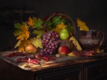 Autumn Still Life With Maple Leaves And Fruits