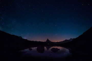 the matterhorn at night with stars