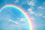 Fototapeta Tęcza - blue sky and clouds with rainbow