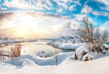 Breathtaking winter scenery with lots of snow  in small fishing village and snowy  mountain peaks near Valberg.