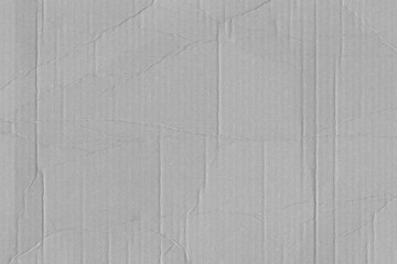 White vintage rough sheet of carton. Recycled environmentally friendly cardboard paper texture. Simple gray minimalist papercraft background.