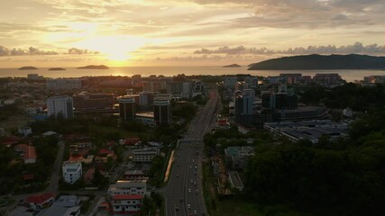 Canvas Print - Aerial Footage of Beautiful sunset with dramatic burning cloud in Kota Kinabalu, Sabah, Malaysia