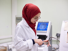 Young Muslim Woman Is Working In A Lab