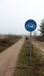 © Marcel/Stocksy - Bicycle path through nature