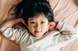 © Pansfun Images/Stocksy - cute Asian little girl at home
