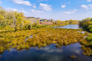 Wall Mural - Sakmara river and Red Mountain camping on the shore. The picture was taken in Russia, in the Orenburg region, in the village of Saraktash