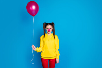 Canvas Print - Portrait of her she nice attractive sad bored sullen gloomy girl circus clown holding in hand helium ball dull event occasion isolated over bright vivid shine vibrant blue color background