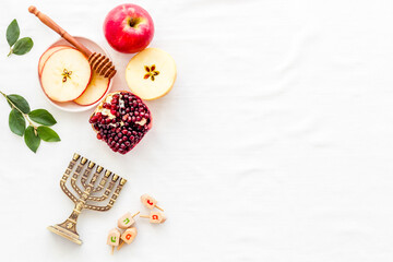 Wall Mural - Rosh Hashana jewish new year concept. Apple and honey on the table, top view