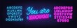 © TanyaFox - You are enough neon quote. Inspirational glowing lettering. Neon alphabet on brick wall background.