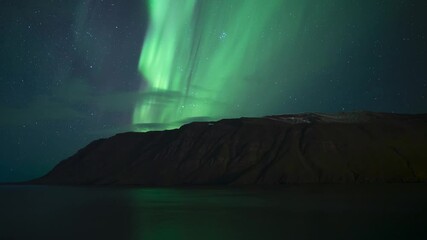 Wall Mural - brilliant aurora borealis over scenic mountain fjord iceland