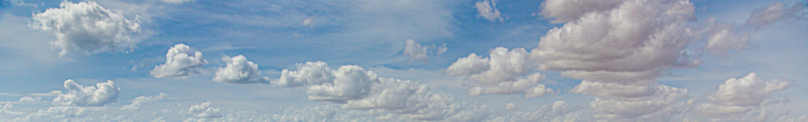Wall Mural - Image of a partly cloudy and partly clear sky during the day