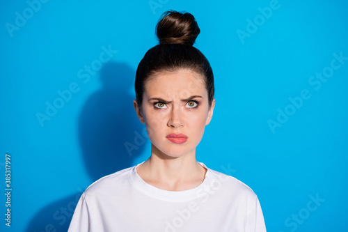 Close-up portrait of her she nice-looking attractive pretty gloomy grumpy sullen mad angry girl dislike new haircut salon coiffure isolated over bright vivid sine vibrant blue color background