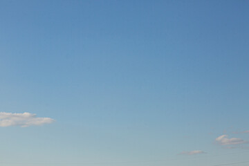 Wall Mural - Image of a partly cloudy and partly clear sky during the day