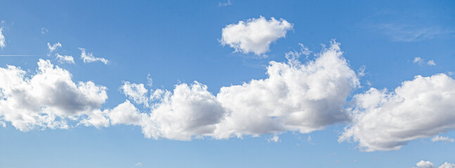 Wall Mural - Image of a partly cloudy and partly clear sky during the day