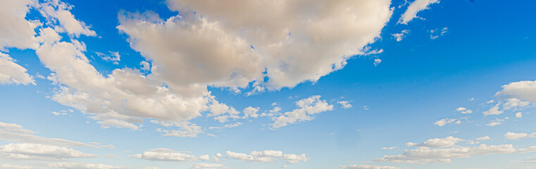 Wall Mural - Image of a partly cloudy and partly clear sky during the day