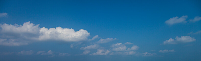 Wall Mural - Image of a partly cloudy and partly clear sky during the day